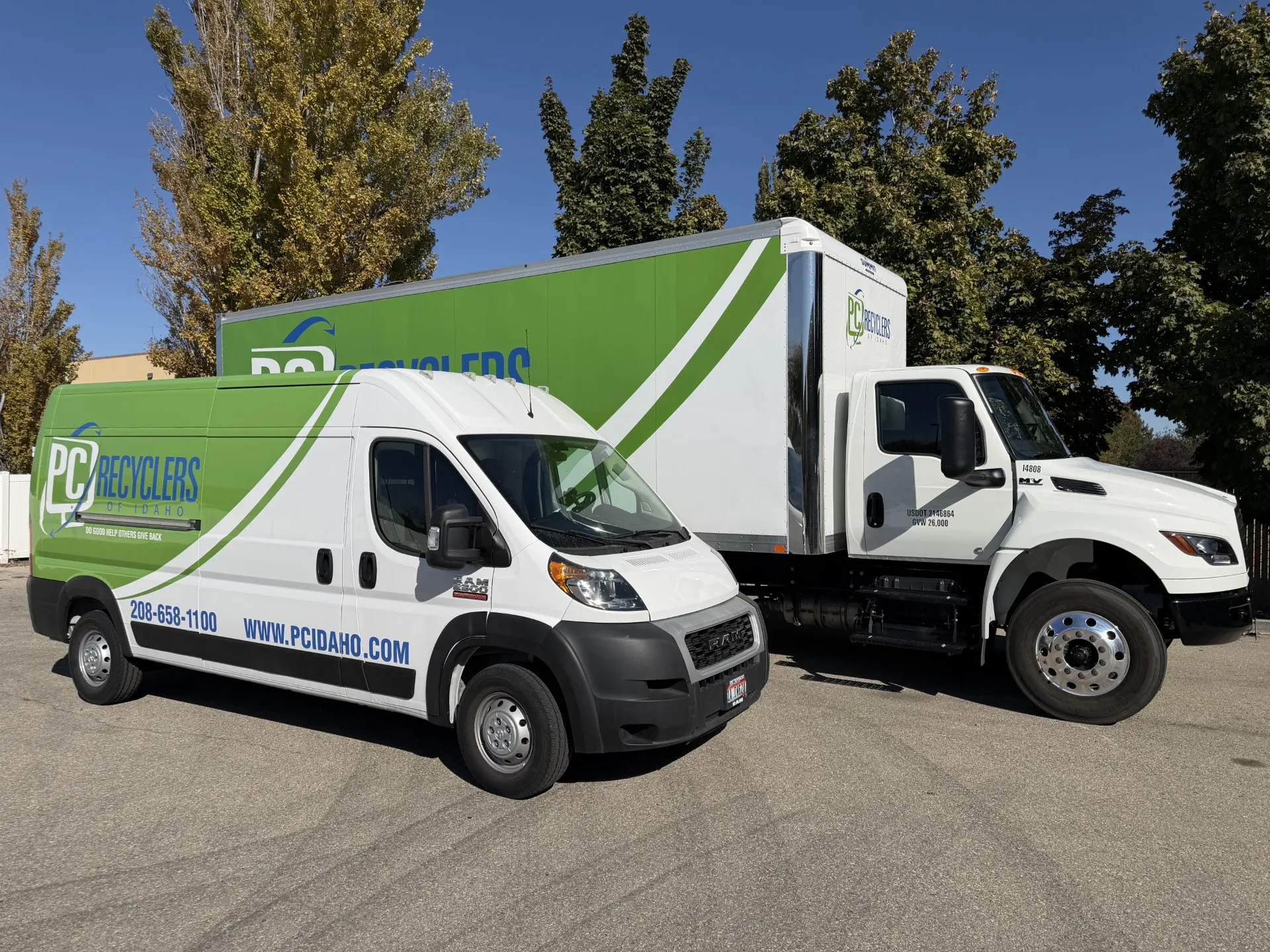 PC Recyclers van and box truck ready for free business pickups